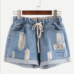 Ripped elastic drawstring Jean shorts